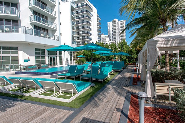 artificial grass used in pool area of hotel easygrass