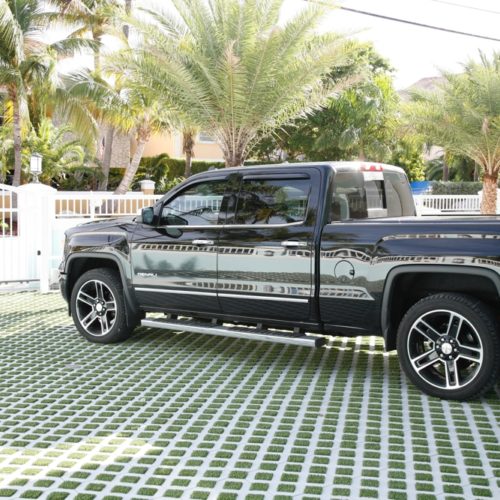 car on easyblock driveway with concrete block artificial grass inserts