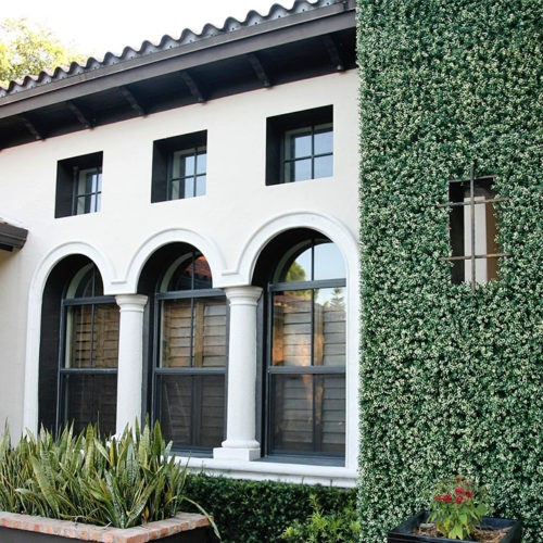 fake ivy used as green wall and artificial living wall on house easyivy